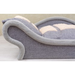 Détail du canapé élégant pour chat et chien avec une structure en tissu gris et un coussin gris et écru