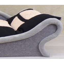 Zoom sur un canapé-lit avec une armature grise pour chien et chat muni d'un coussin noir et écru