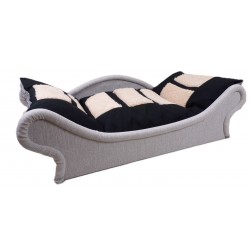 Sofa cosy écru pour chat avec un couchage lavable en machine ; le coussin est noir avec des rectangles écrus imprimés.