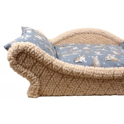 Canapé -lit écru pour chat avec une armature en tissu bouclette beige clair le coussin est de couleur lavande