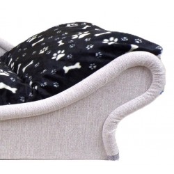 Zoom sur le canapé confortable pour chat et petit chien en tissu noir avec des pattes et des os