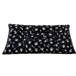 Coussin de sol noir avec des impressions de pattes et d'os pour chien